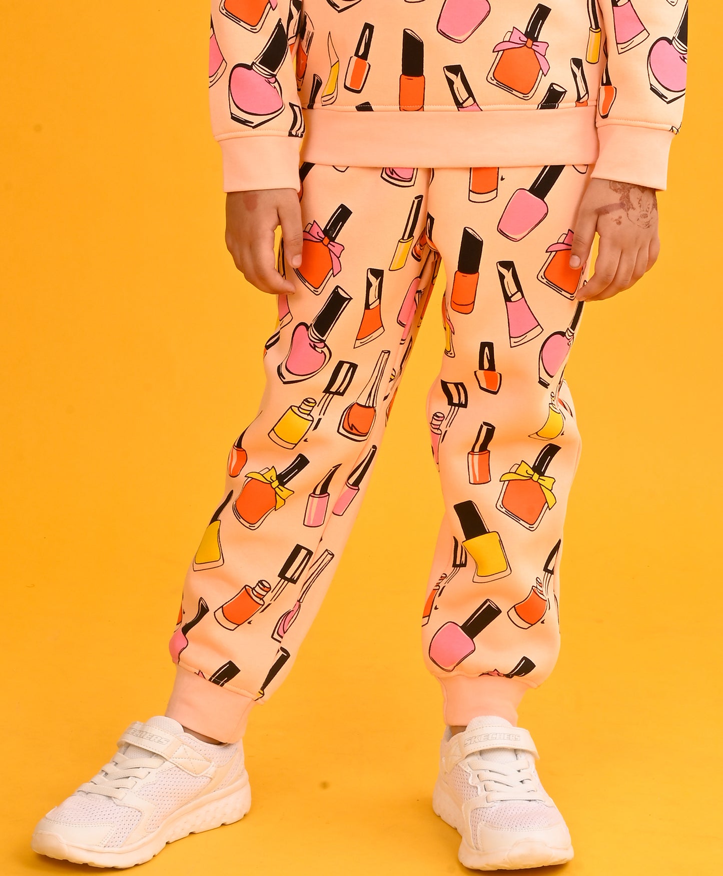 NAIL PAINT FLEECE GIRLS JOGGER-PEACH