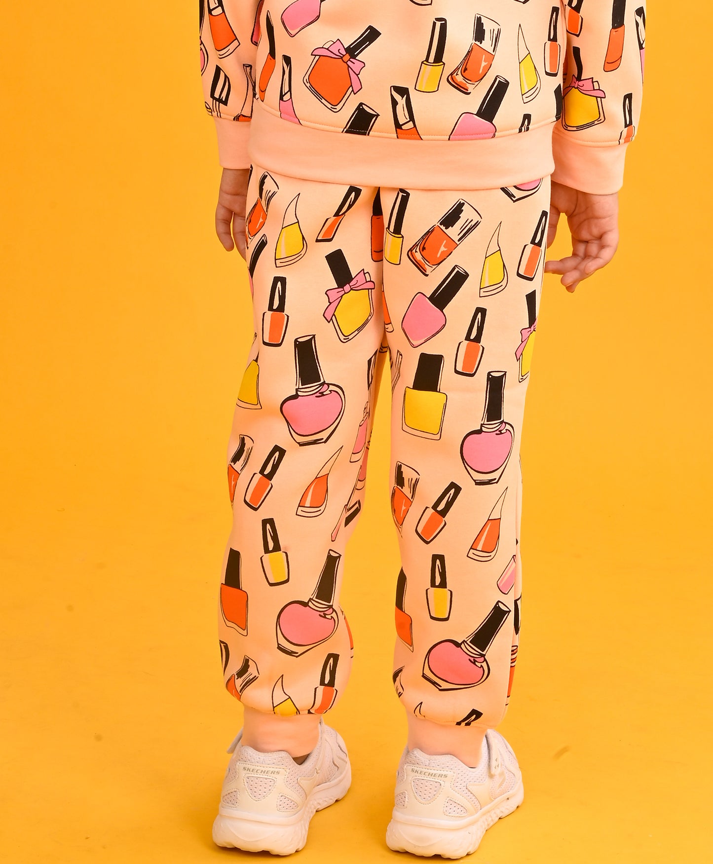 NAIL PAINT FLEECE GIRLS JOGGER-PEACH